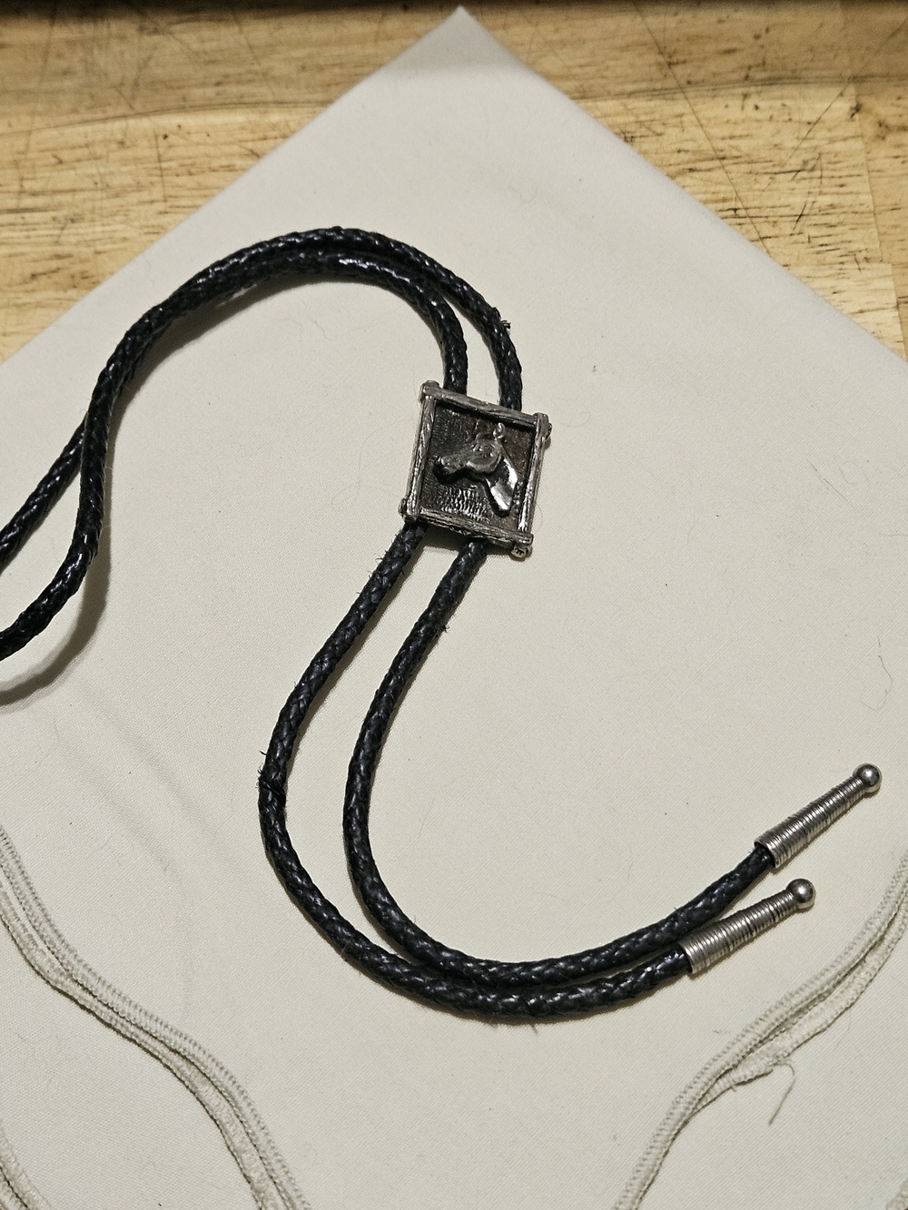 Black Braided Leather Bolo Tie with Horse Silver Accent